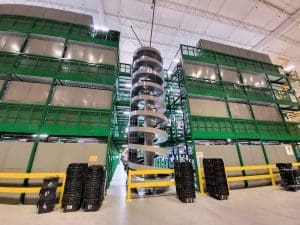 Spiral conveyor with pick tower